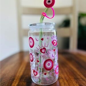 Clear acrylic Tumbler with Pink Eye Design and Straw